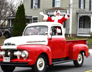 Truck carrying Santa in parade
